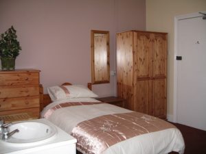 Bedroom at Cheam road care home