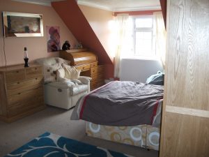 Loft bedroom at rogerstone house care service