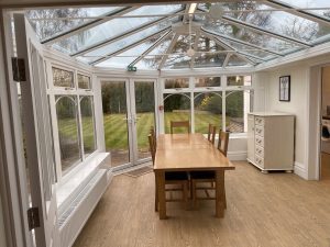 Conservatory room in white lodge achieve together home