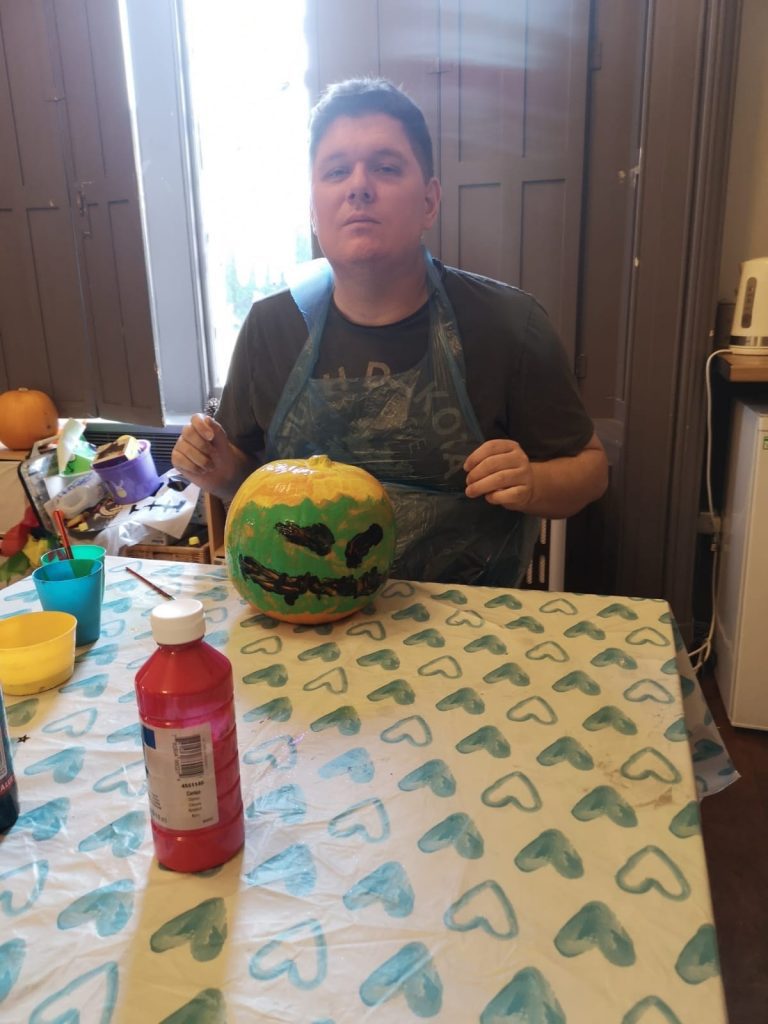 tony from arrowe hall social care service with his zombie pumpkin